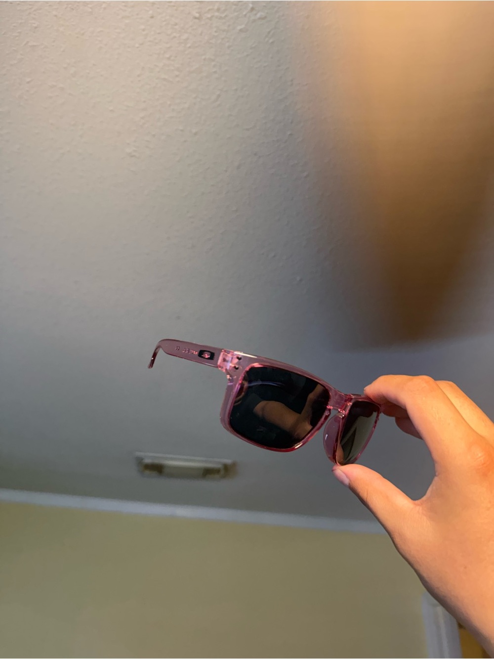 Translucent Pink Sunglasses with Dark Lenses Oakley Oakleys